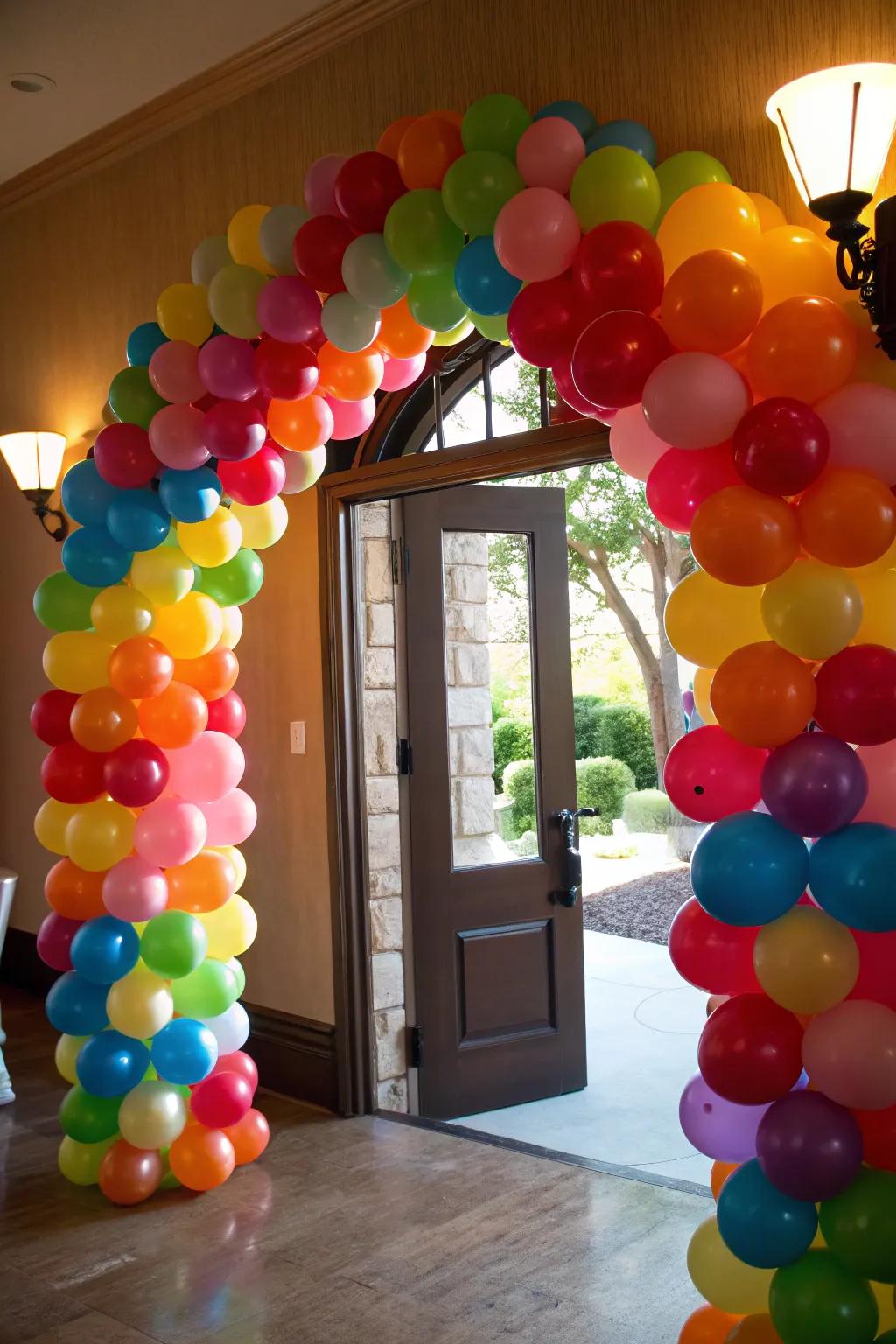 A colorful balloon arch makes a welcoming entrance.