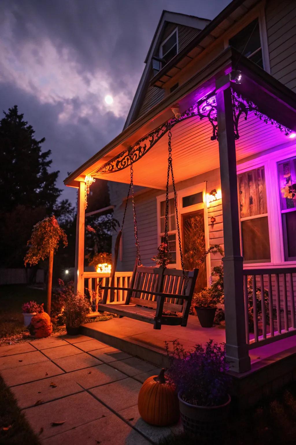 Orange and purple lights set the stage for a spooky porch.