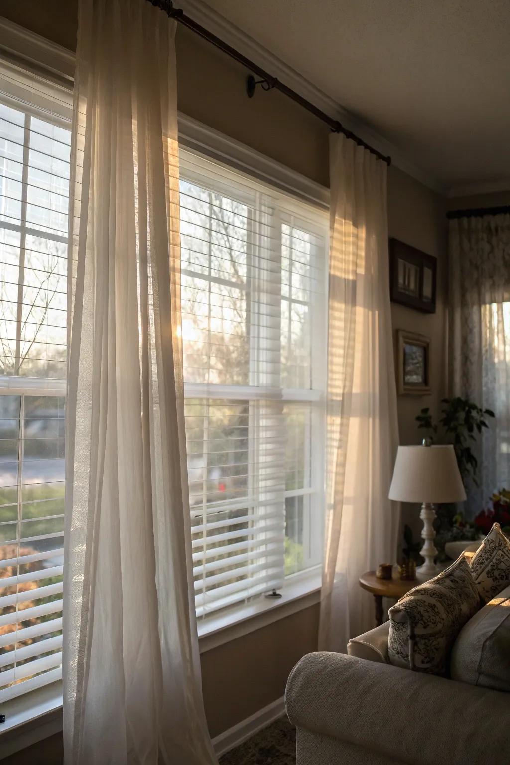 Sheer curtains paired with solid blinds establish a refined and gentle ambiance.