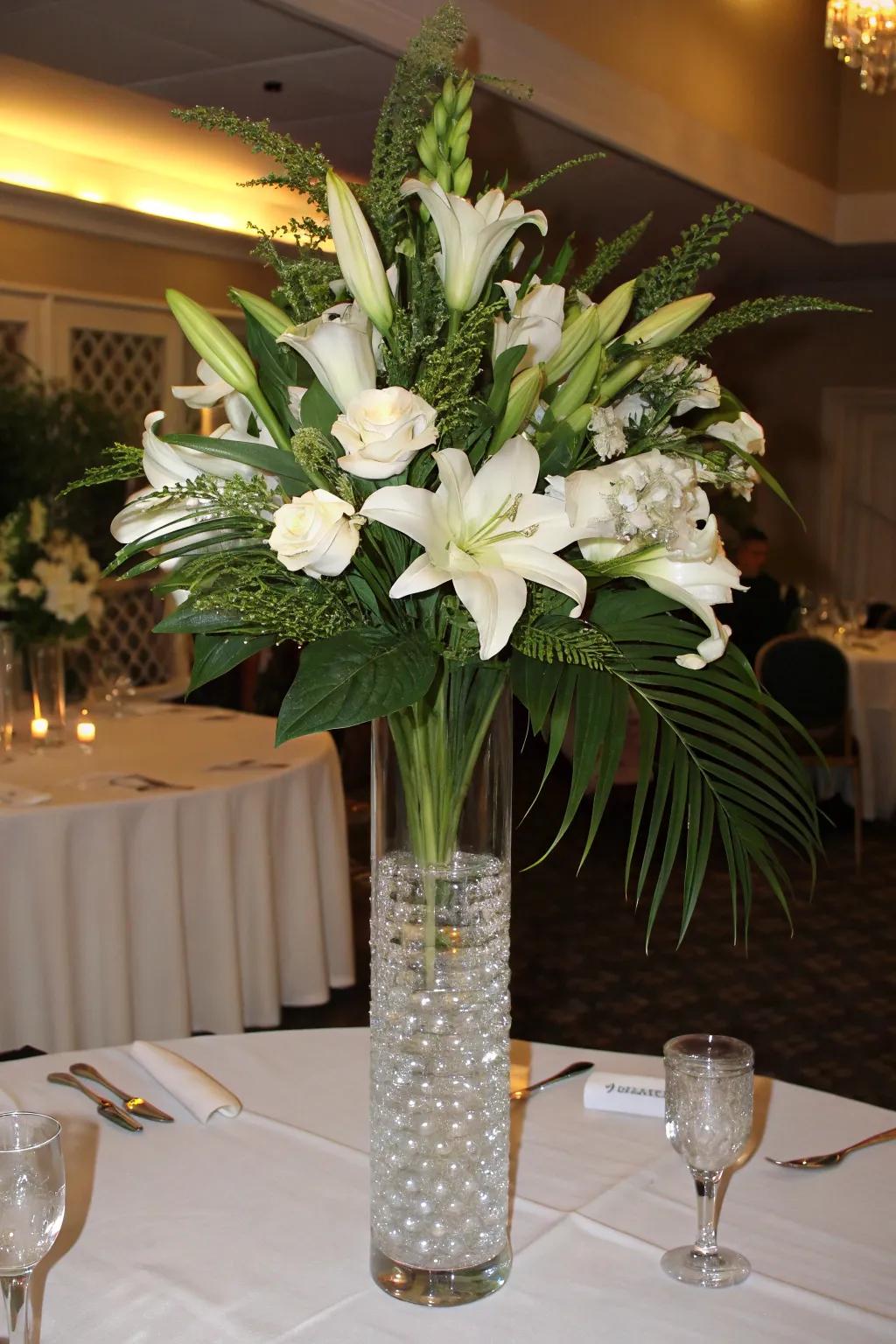 Quintessential floral display featuring towering white lilies and rich verdure.