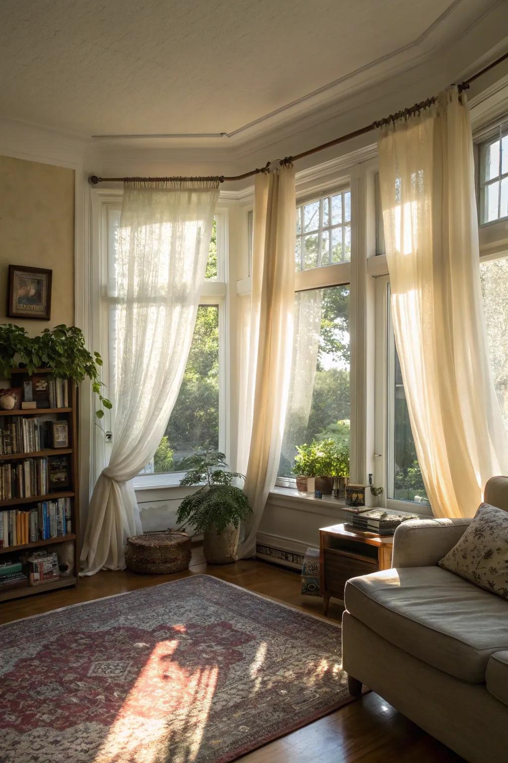 Translucent curtains bestow a light and airy quality upon bow windows.