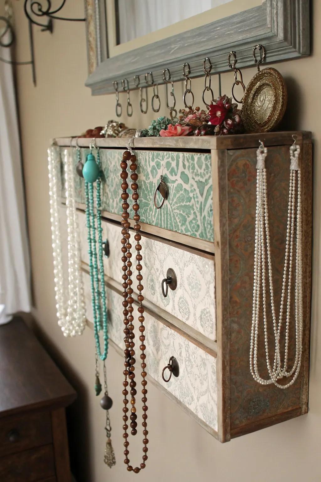 An antique drawer transformed into a chic necklace showcase