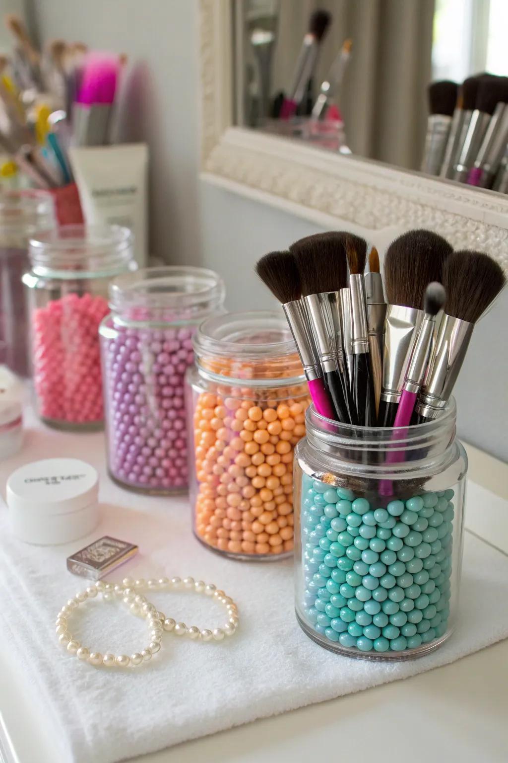 Sophisticated glass containers enhanced with beads offer an elegant and practical display for makeup brushes.