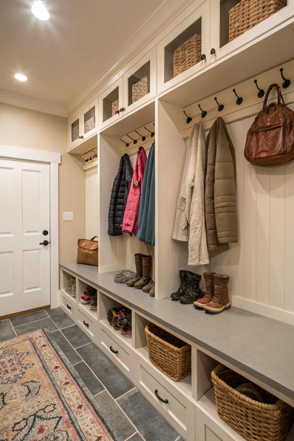 A mudroom showcasing integrated cubbies with shoes arranged neatly.