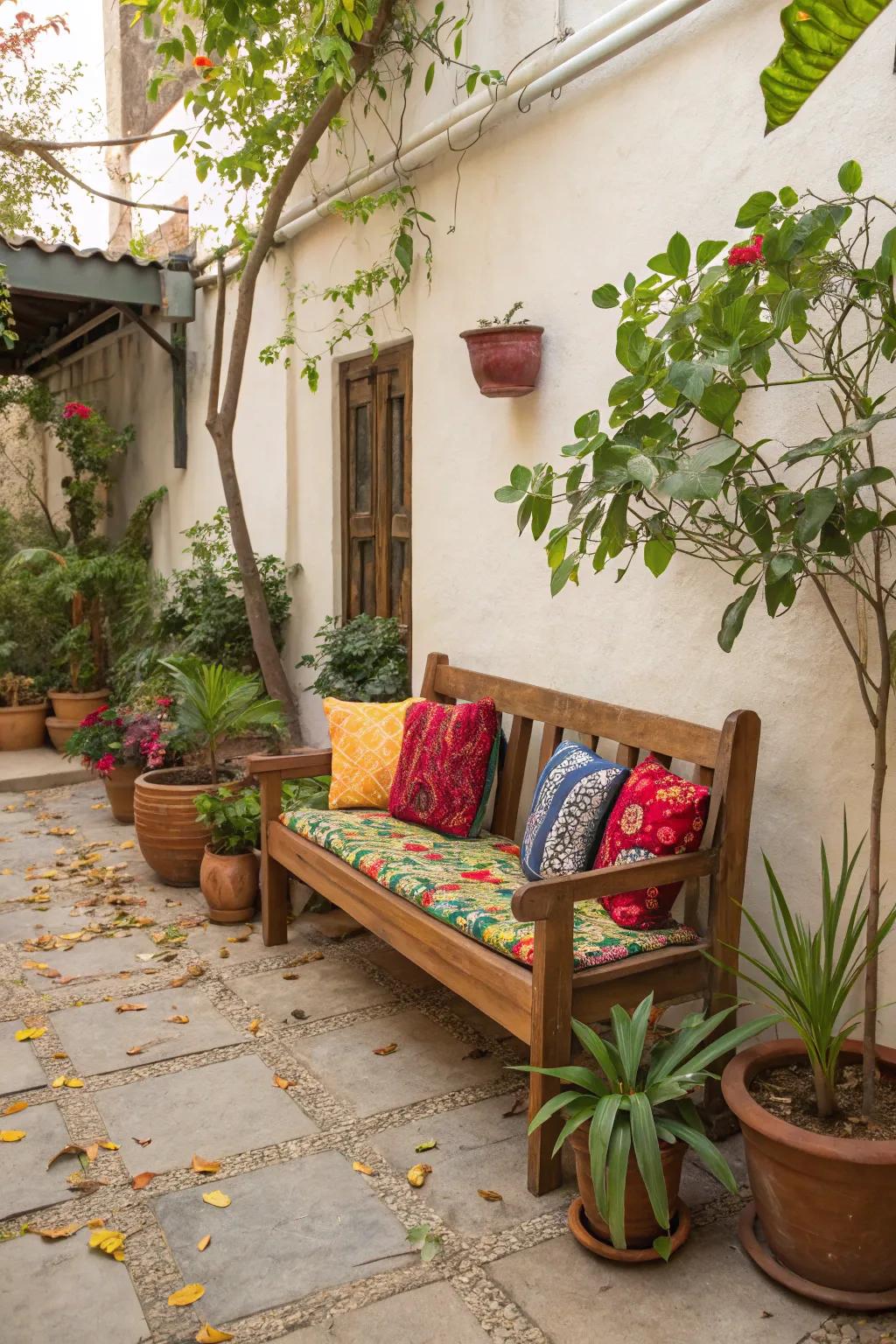 A restored bench with colorful cushions produces an inviting seating spot.
