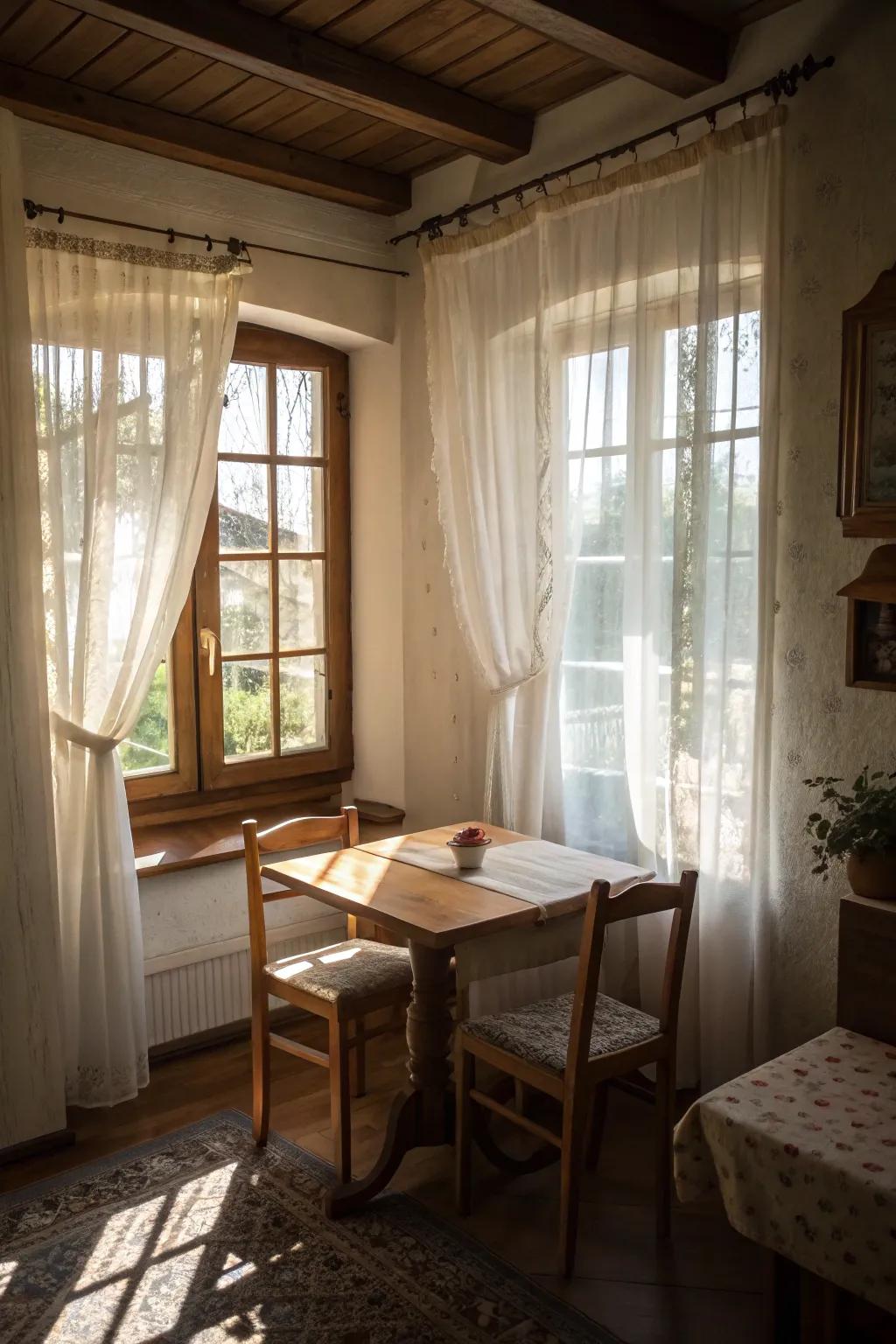 Sheer window coverings bestow a luminous and spacious sensation within a compact dining area.