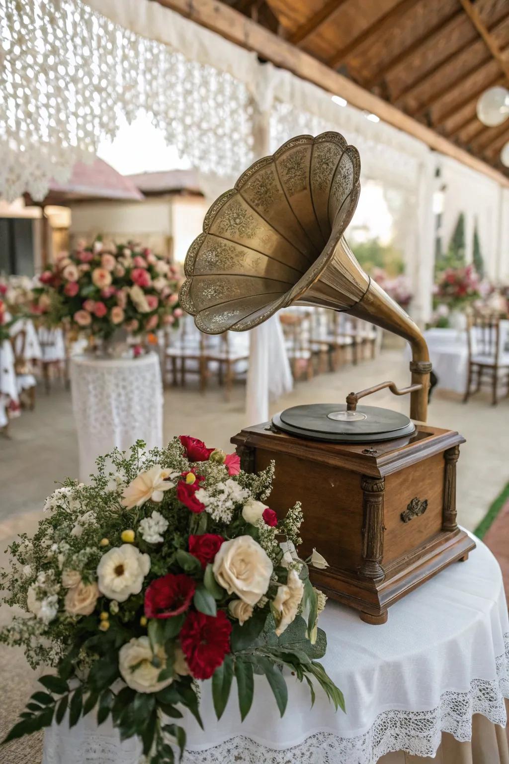 An antique talking machine centerpiece exquisitely decorated with fresh flowers.
