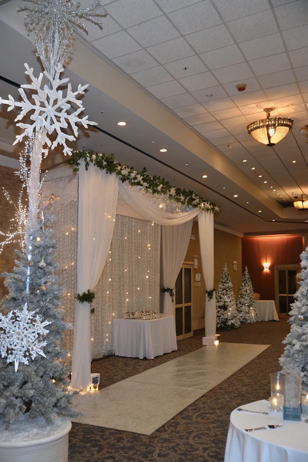 A serene winter wonderland baby shower theme with snowflake decorations and silver accents.