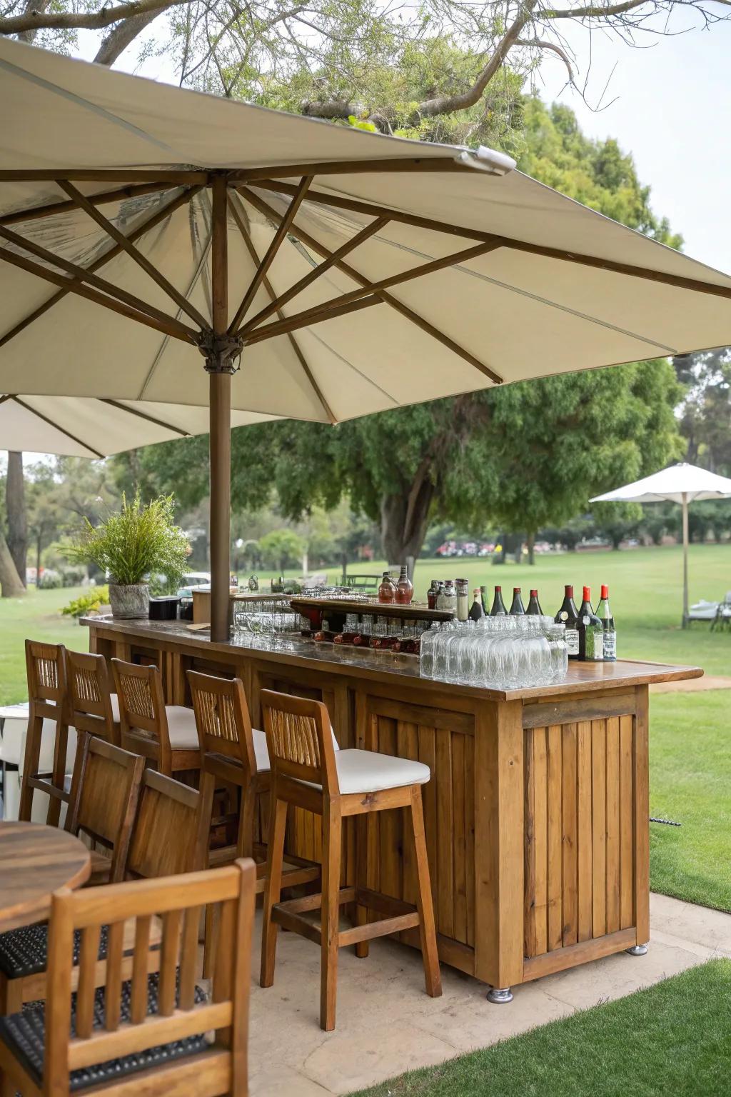 An outdoor bar setup with umbrella shade.