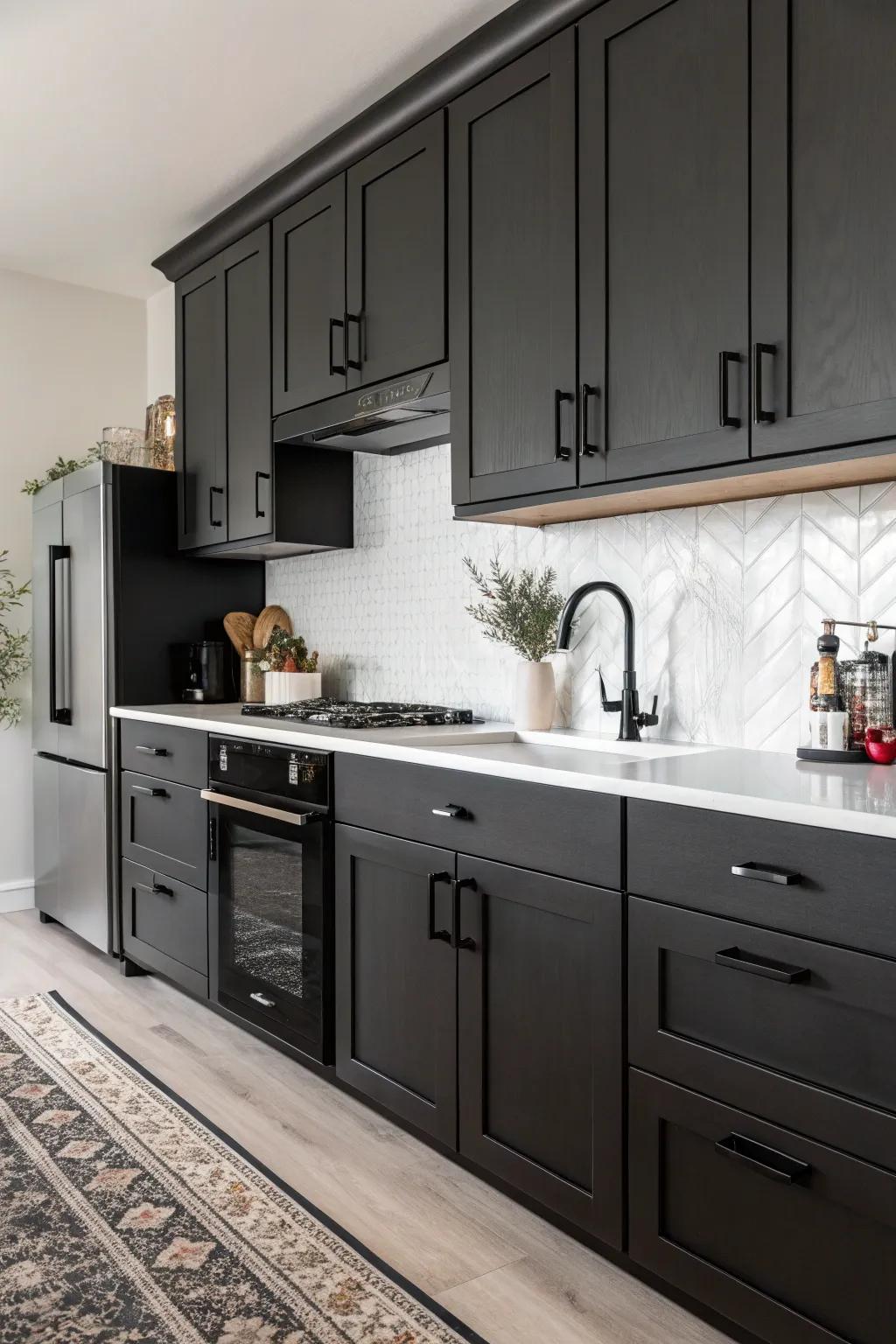 Dark cabinets paired with charcoal ironmongery for a sleek and modern kitchen aesthetic.