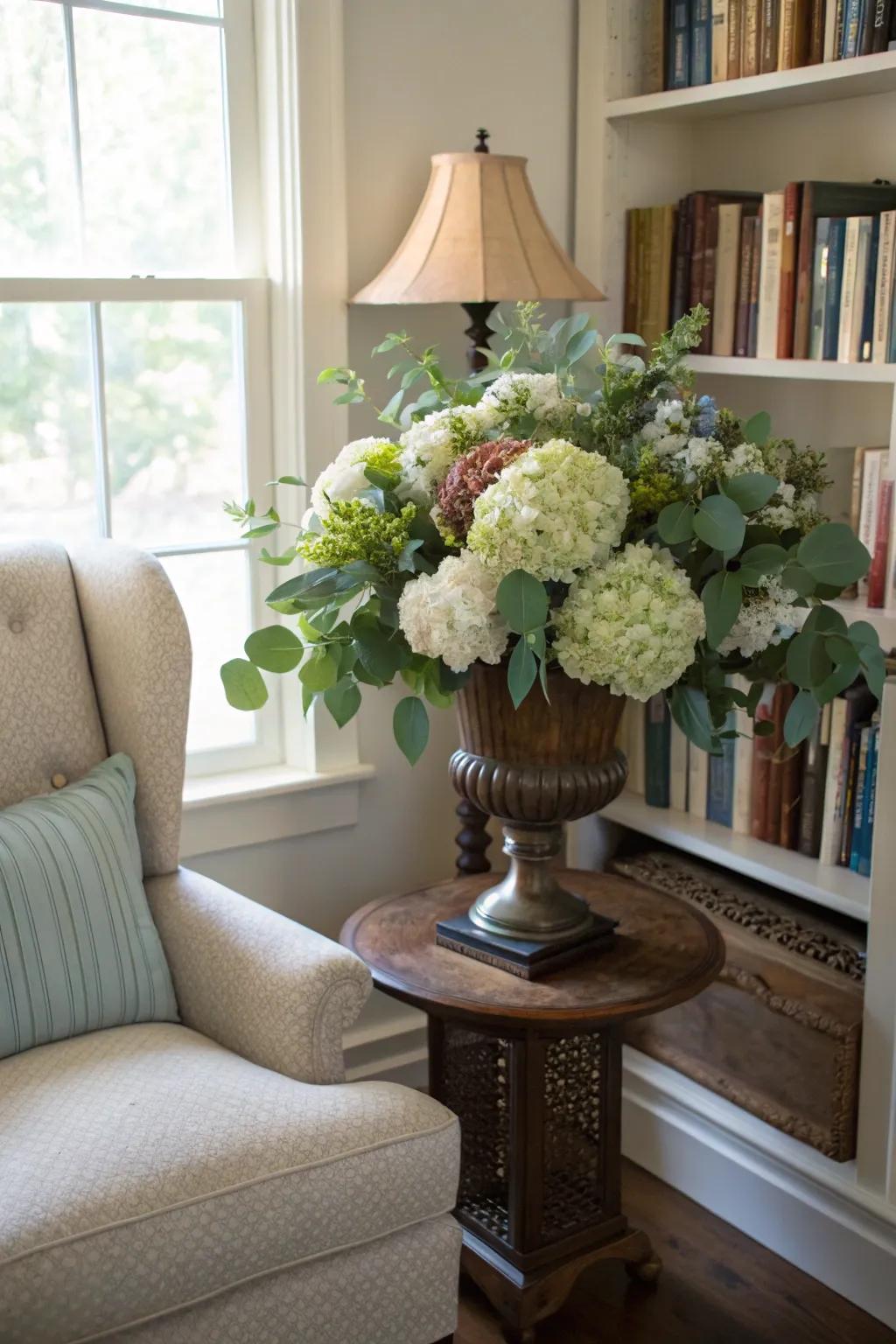 Calming hydrangeas and eucalyptus in an autumnal vessel.