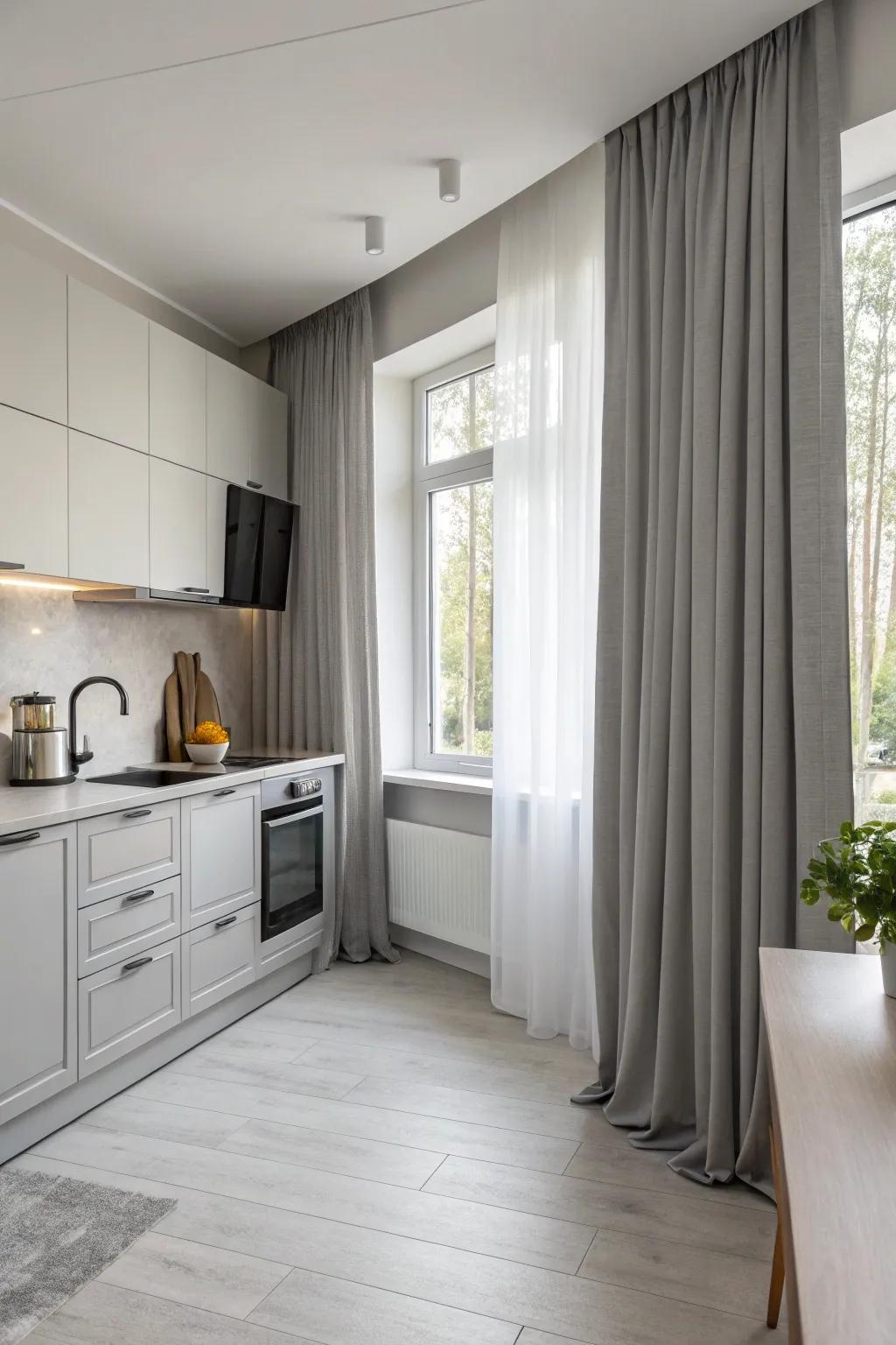 Minimalist gray drapes that coalesce seamlessly with kitchen decor.