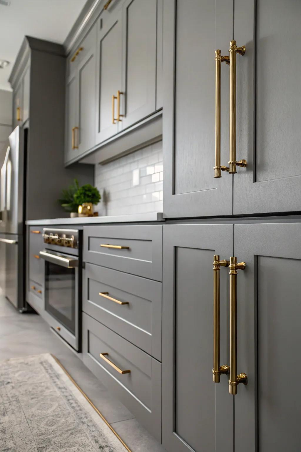 Precious metal embellishments bring a touch of glamour to a grey kitchen.
