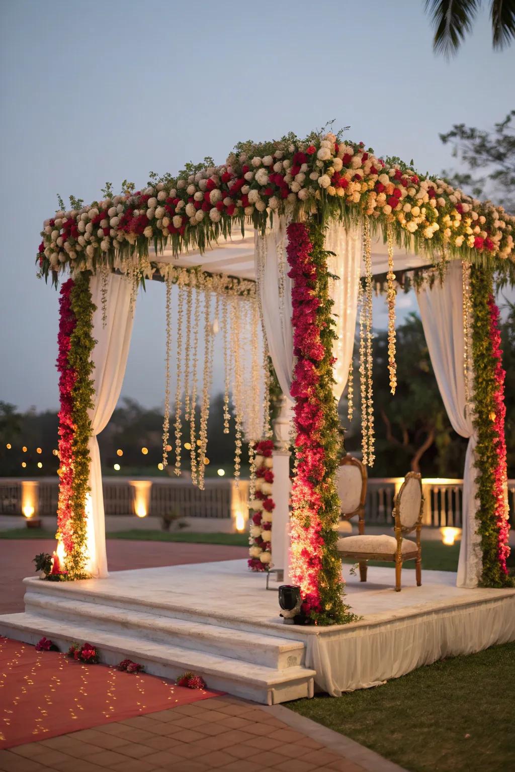 Suspended blossom strands introducing layers of beauty to the mandap.