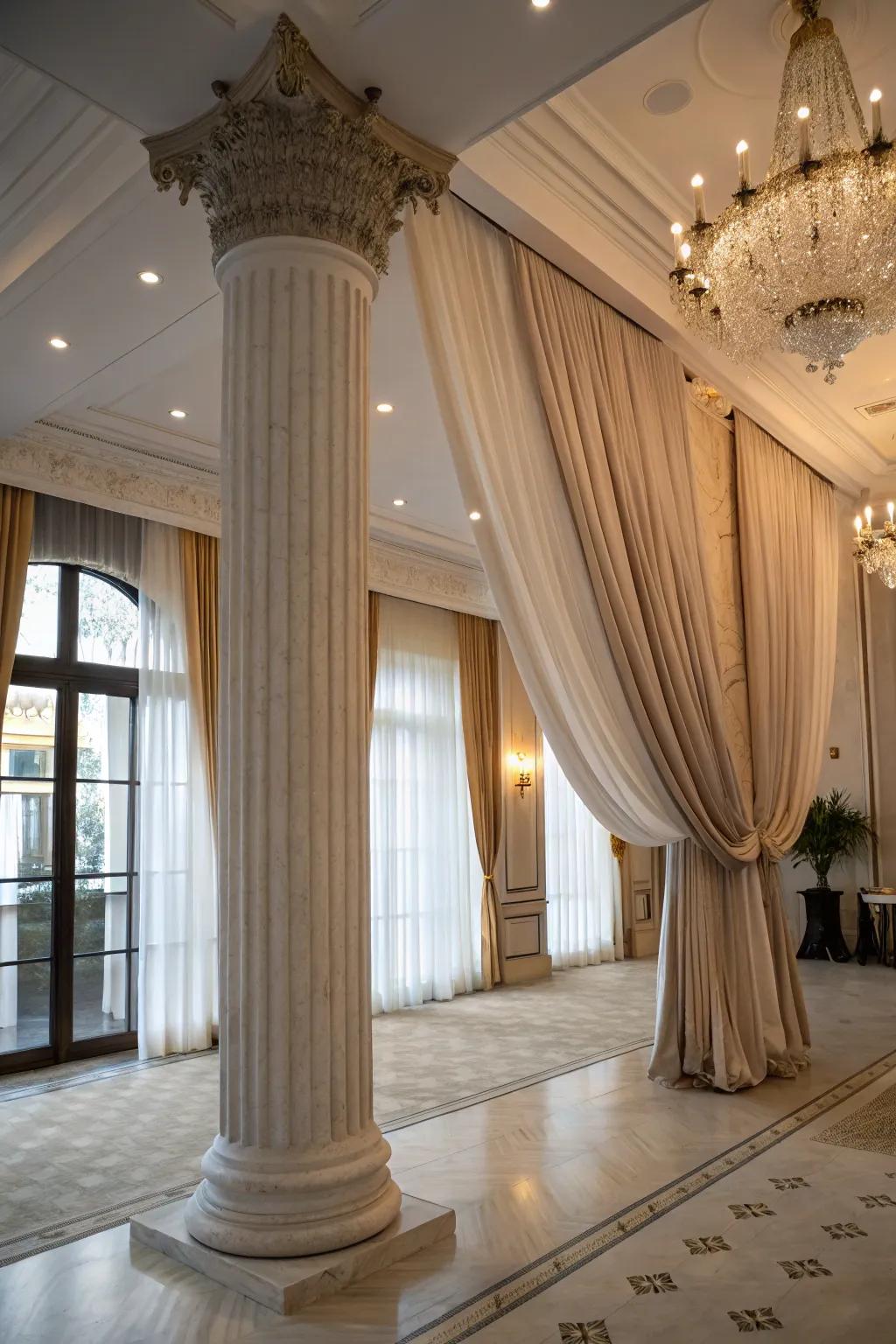 Drapery mitigates and defines columns.