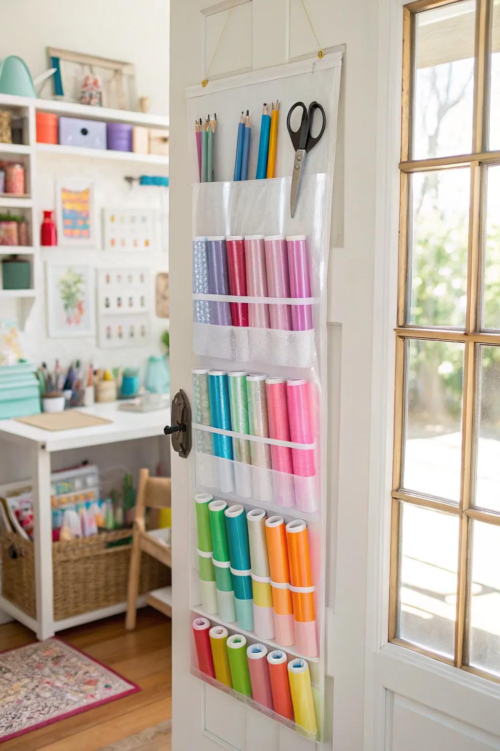 Over-the-door organizers maintain vinyl rolls subtle and reachable.
