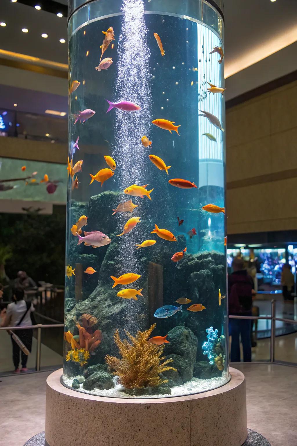A dynamic assembly of fish in a tall aquarium.