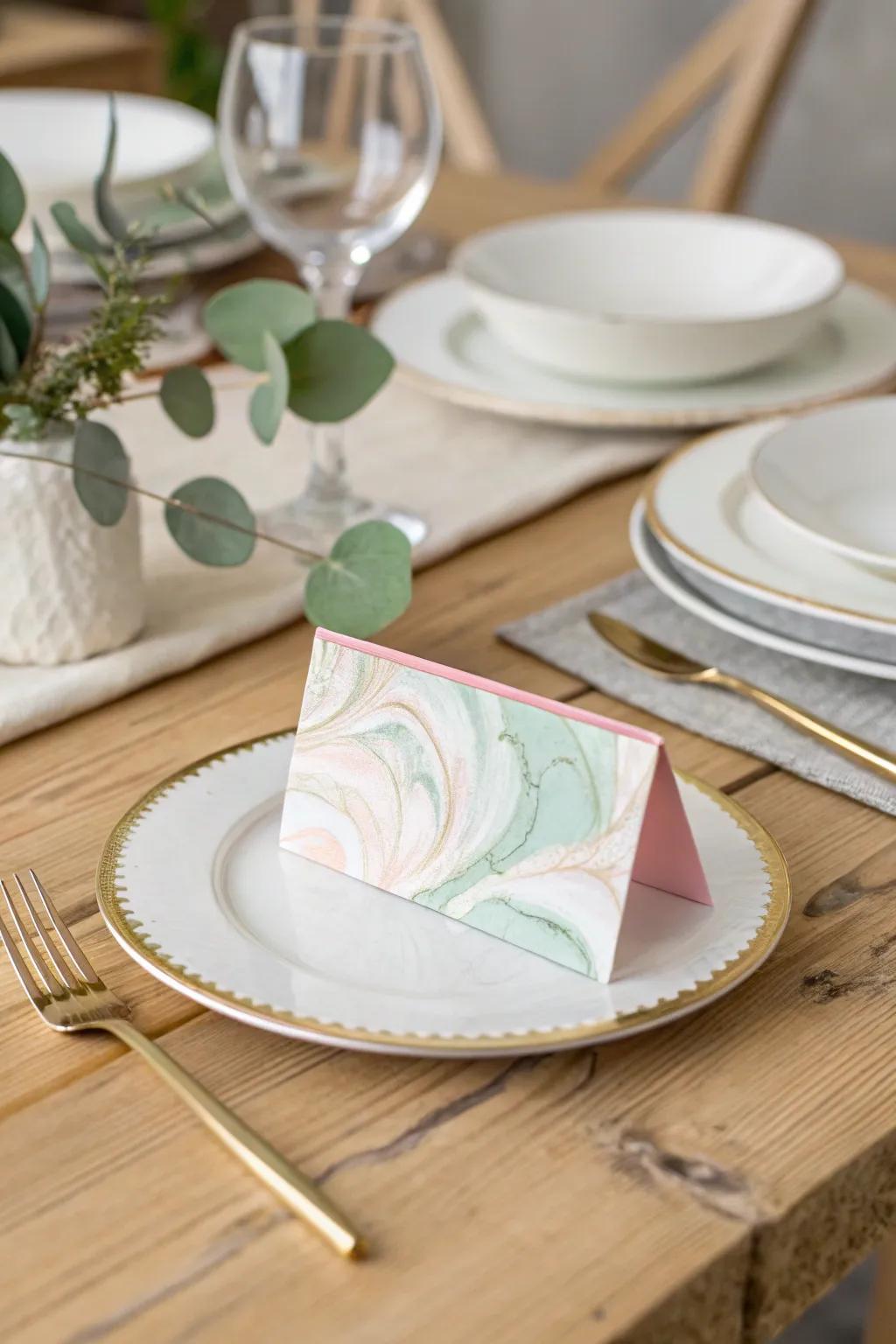 Enhance your convivial festivities through chic marbled name slips, interweaving creative artistry with minimalist elegance.