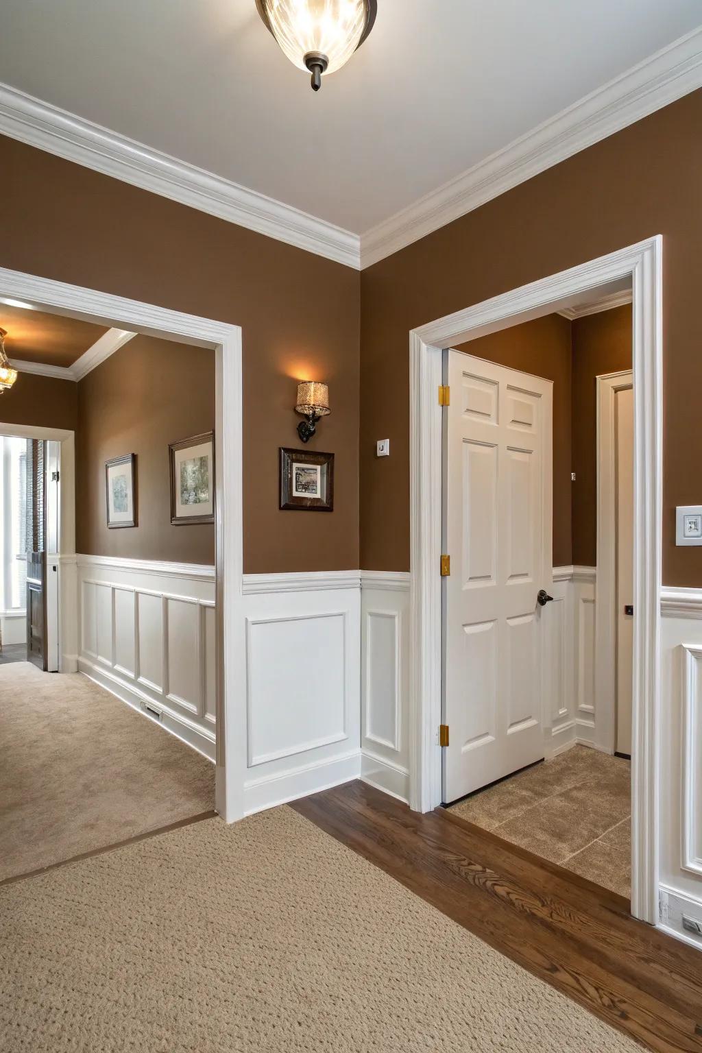 A modern and sophisticated juxtaposition achieved through brown surfaces and alabaster embellishments.
