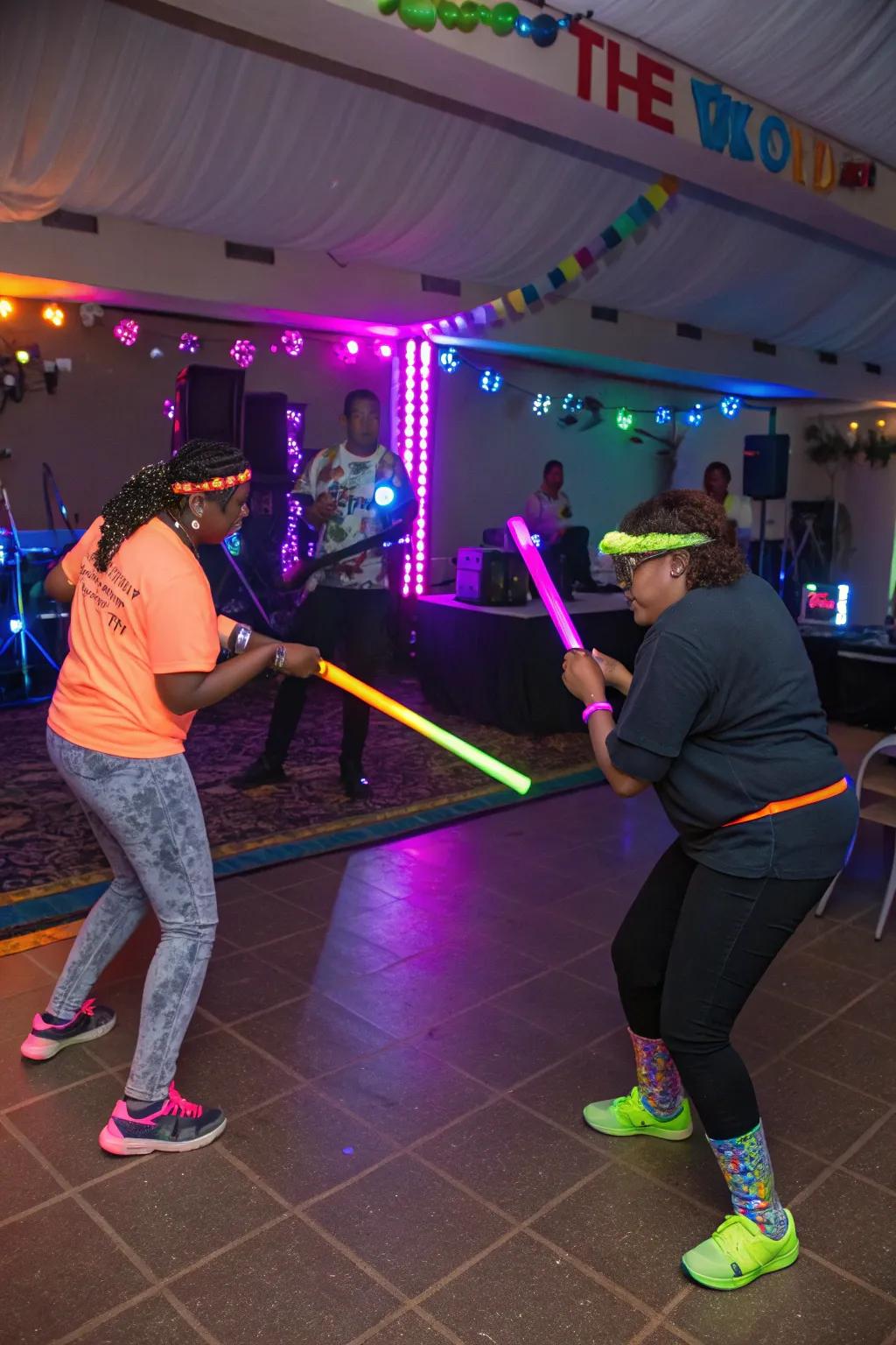 Celebration attendees delighting in neon-themed diversions like glow rod limbo, lending merriment to the festivities.