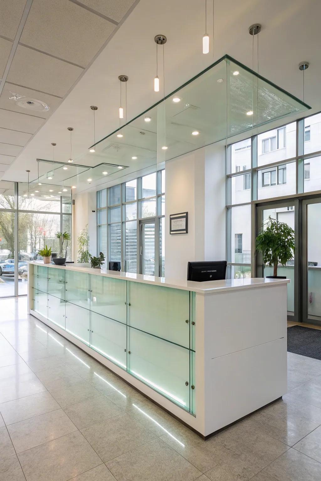 A glass welcome desk that enhances spaciousness and light.