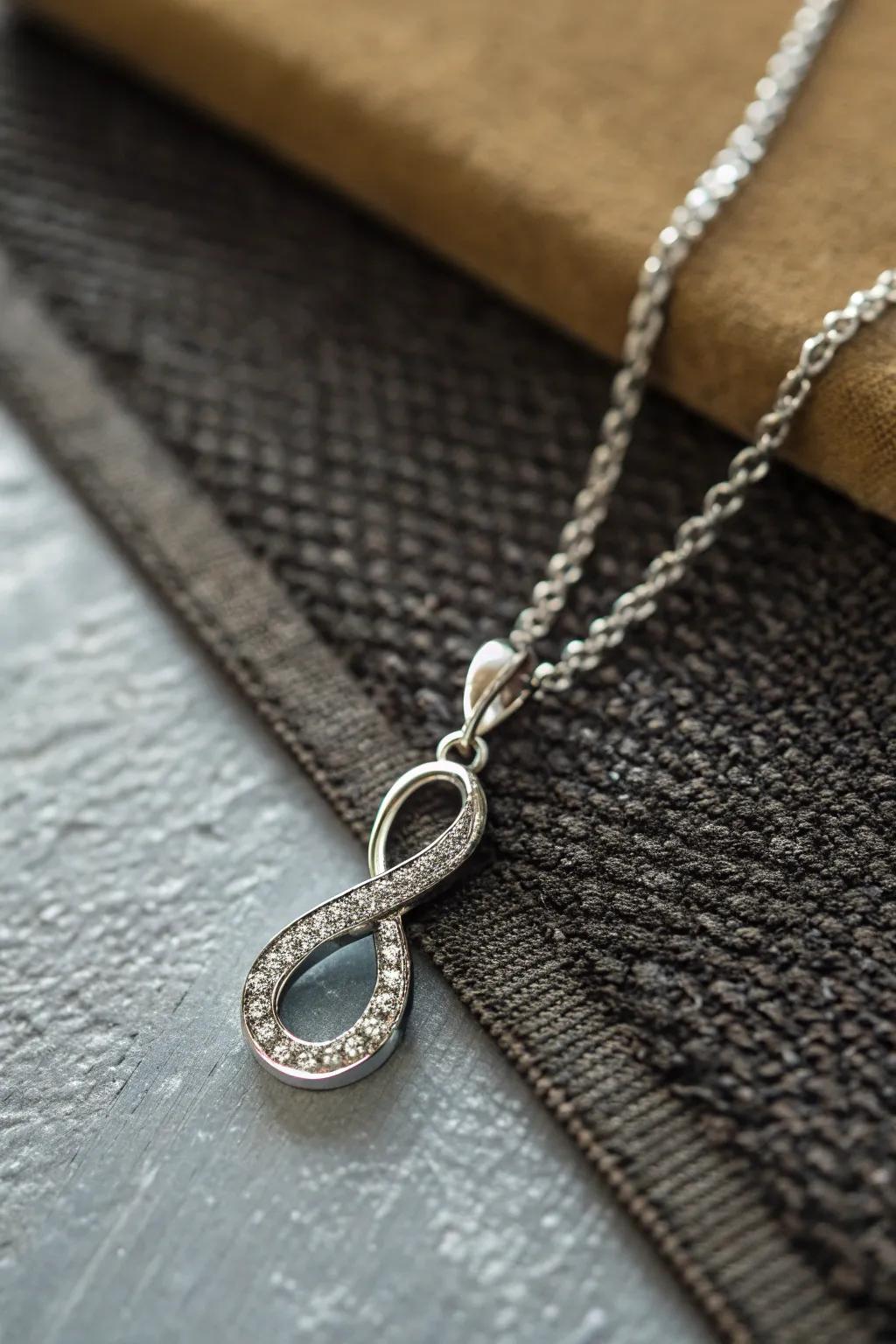 An infinity symbol pendant symbolizing endless affection.