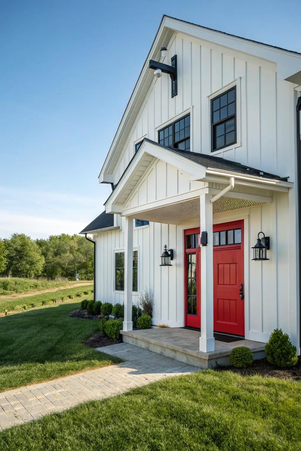 Modern farmhouse with a red entrance, blending tradition with modernity.