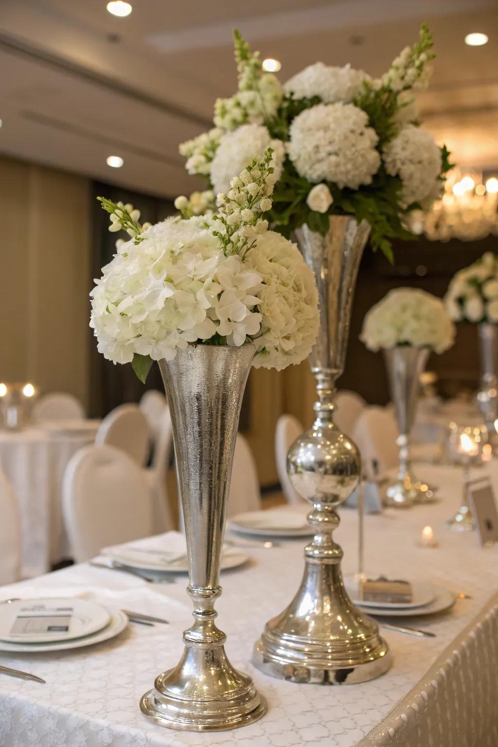 Incorporate timeless splendor through the medium of silver and white floral configurations.