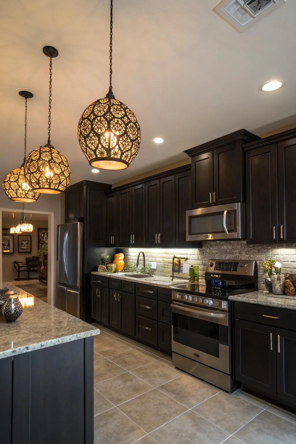 Dark cabinets illuminated by artistic hanging illumination for a creative kitchen space.