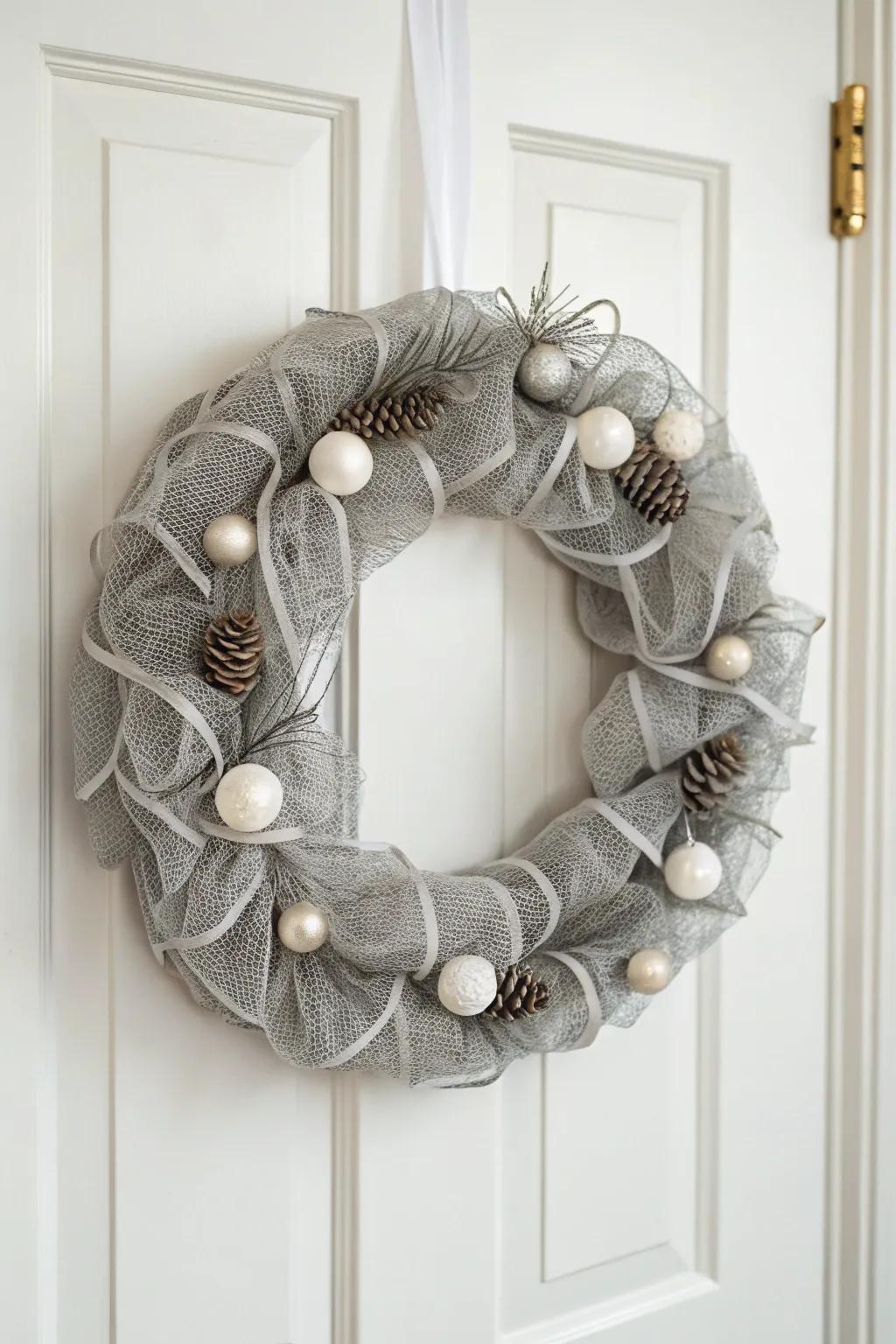 Simplicity and refinement define this minimalist mesh wreath.