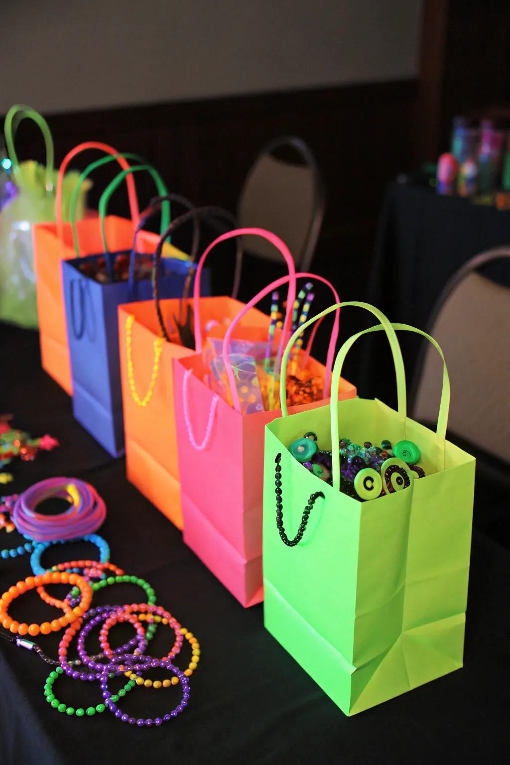 Neon celebration favor bags packed with glow-in-the-dark goodies, sustaining the celebratory essence.