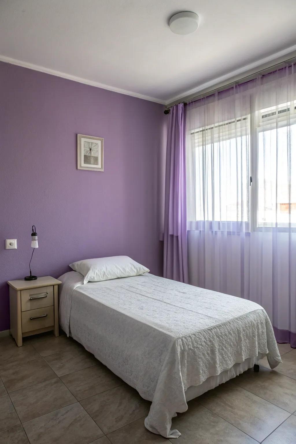 A minimalist approach allows purple walls to shine.