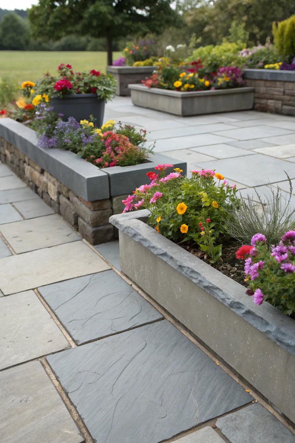 A slate patio complemented by built-in planters for extra greenery.