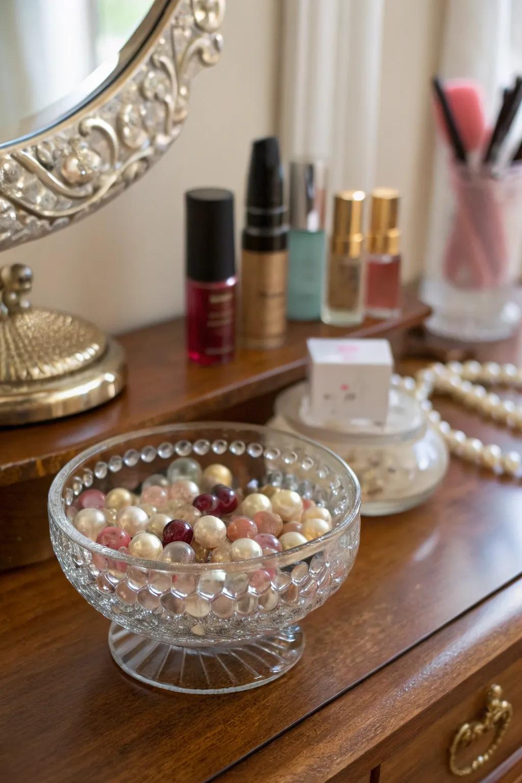 Shimmering sophistication showcasing glass beads within a glass bowl.