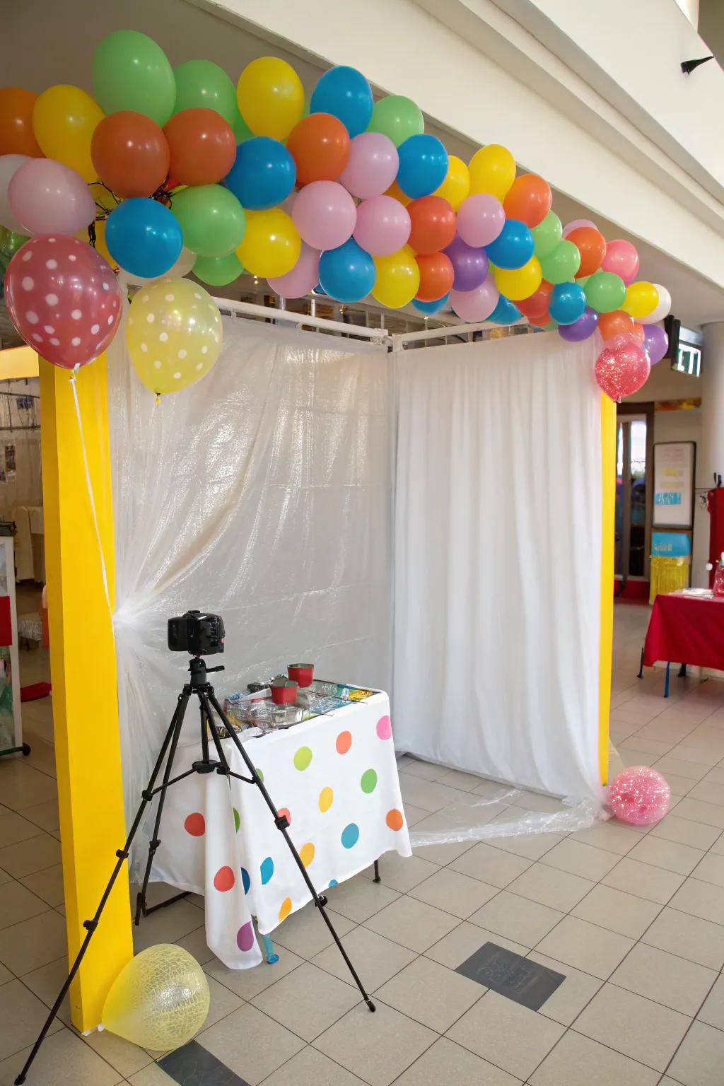 Create a fun photo booth backdrop with tablecloths.