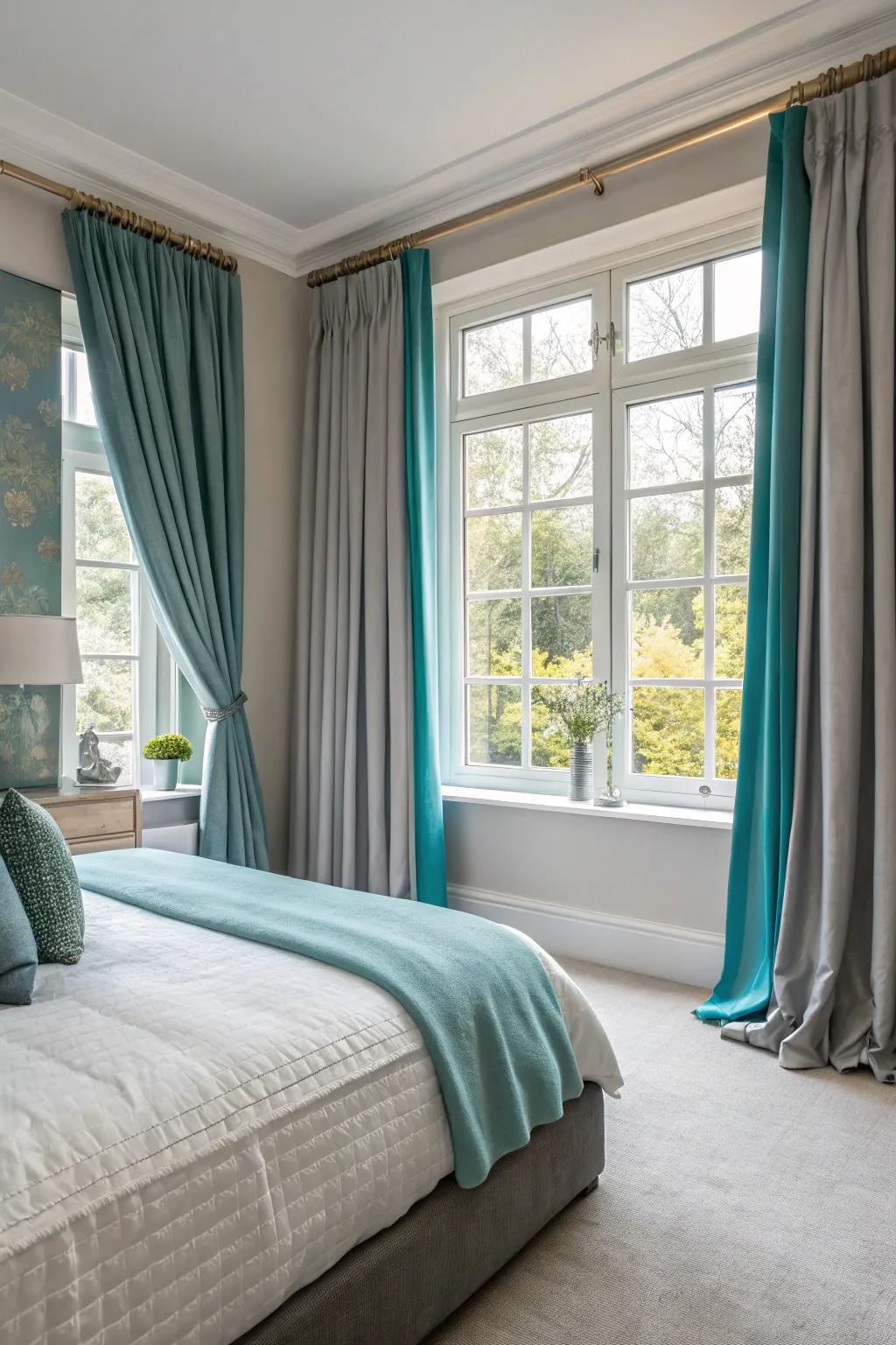 Window dressings in grey and teal complete the room's style.