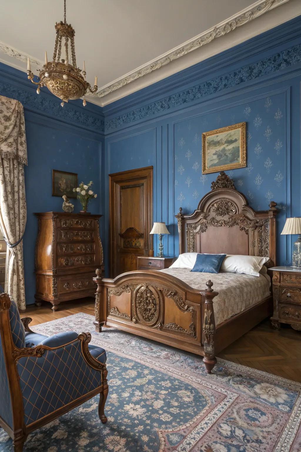 Antique furniture adds a regal charm to the contemporary sapphire blue bedroom.