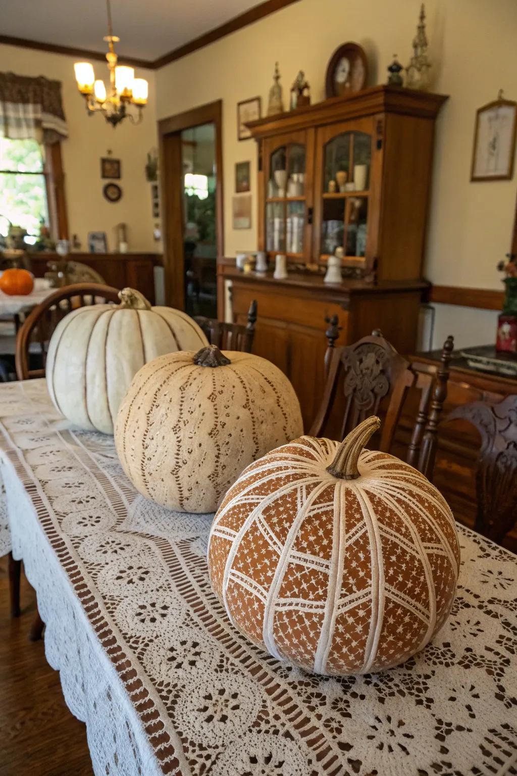 Integrate a note of finesse through pumpkins adorned with delicate lace patterns.