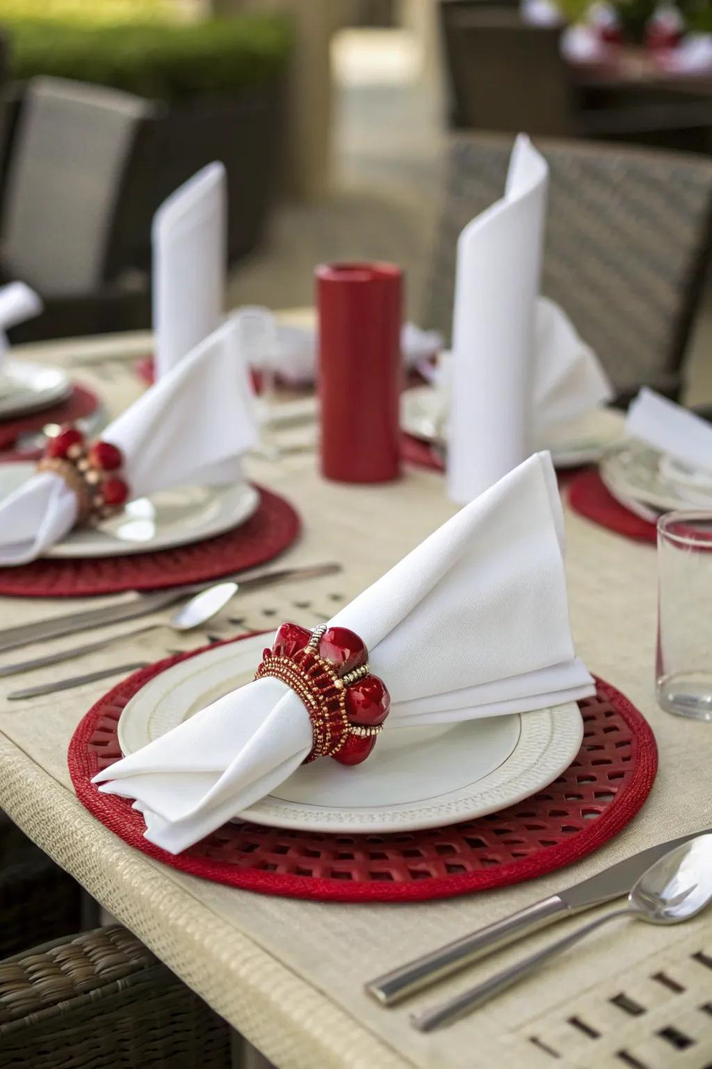 Graceful ruby dining holders appending refinement to the table.