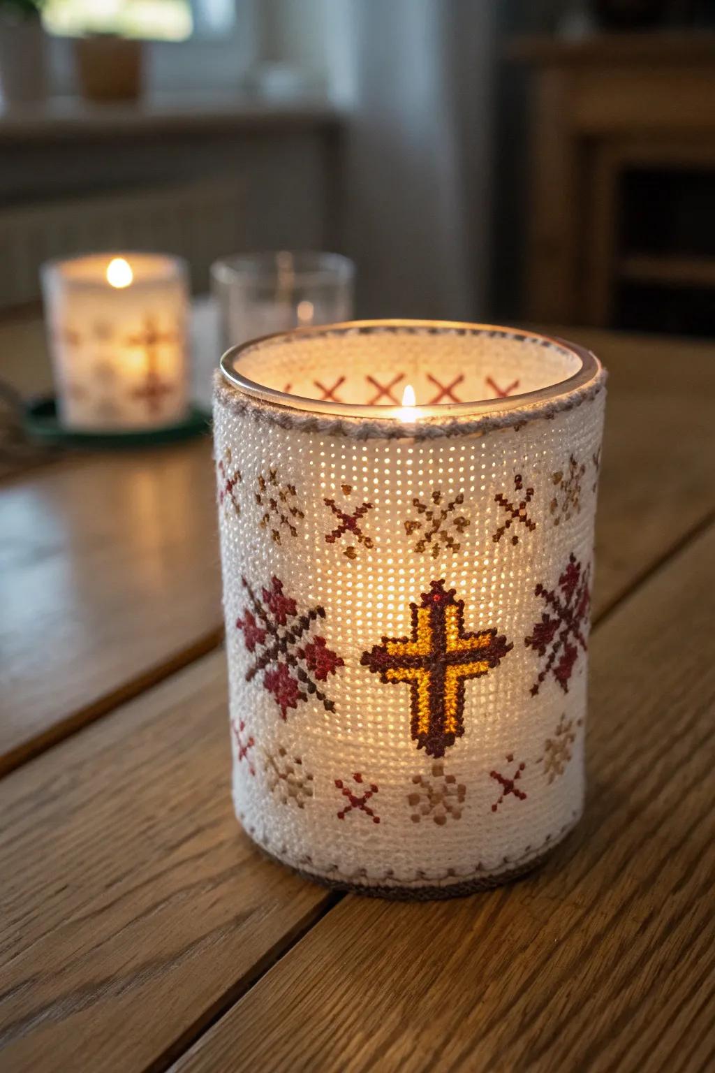 Cross stitch candle holders fashion a cozy, warm ambiance
