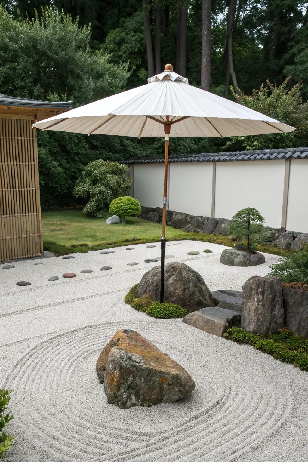A Zen garden with a minimalist umbrella.