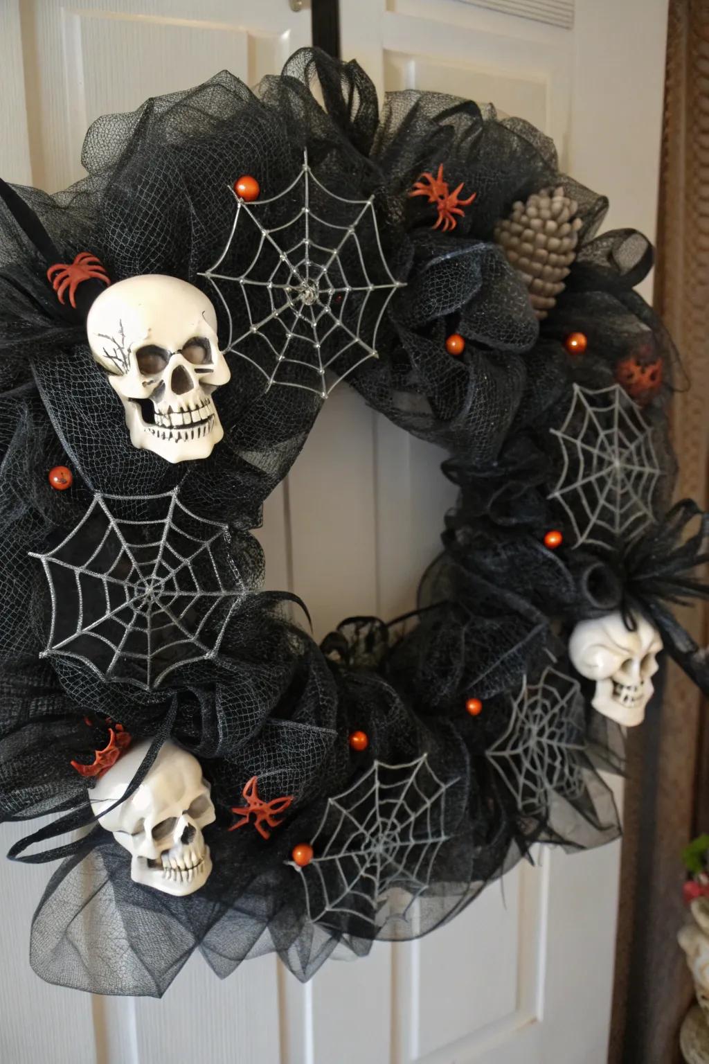 Macabre components introduce an air of eerie elegance to this Halloween wreath.