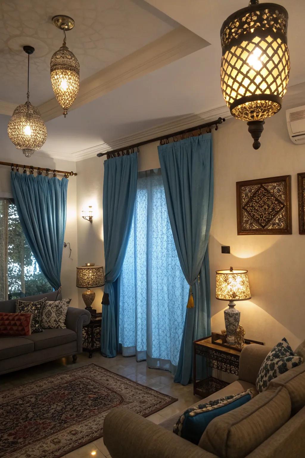 Different illumination fixtures interact with azure window coverings to alter the mood and elevate the room's ambiance.