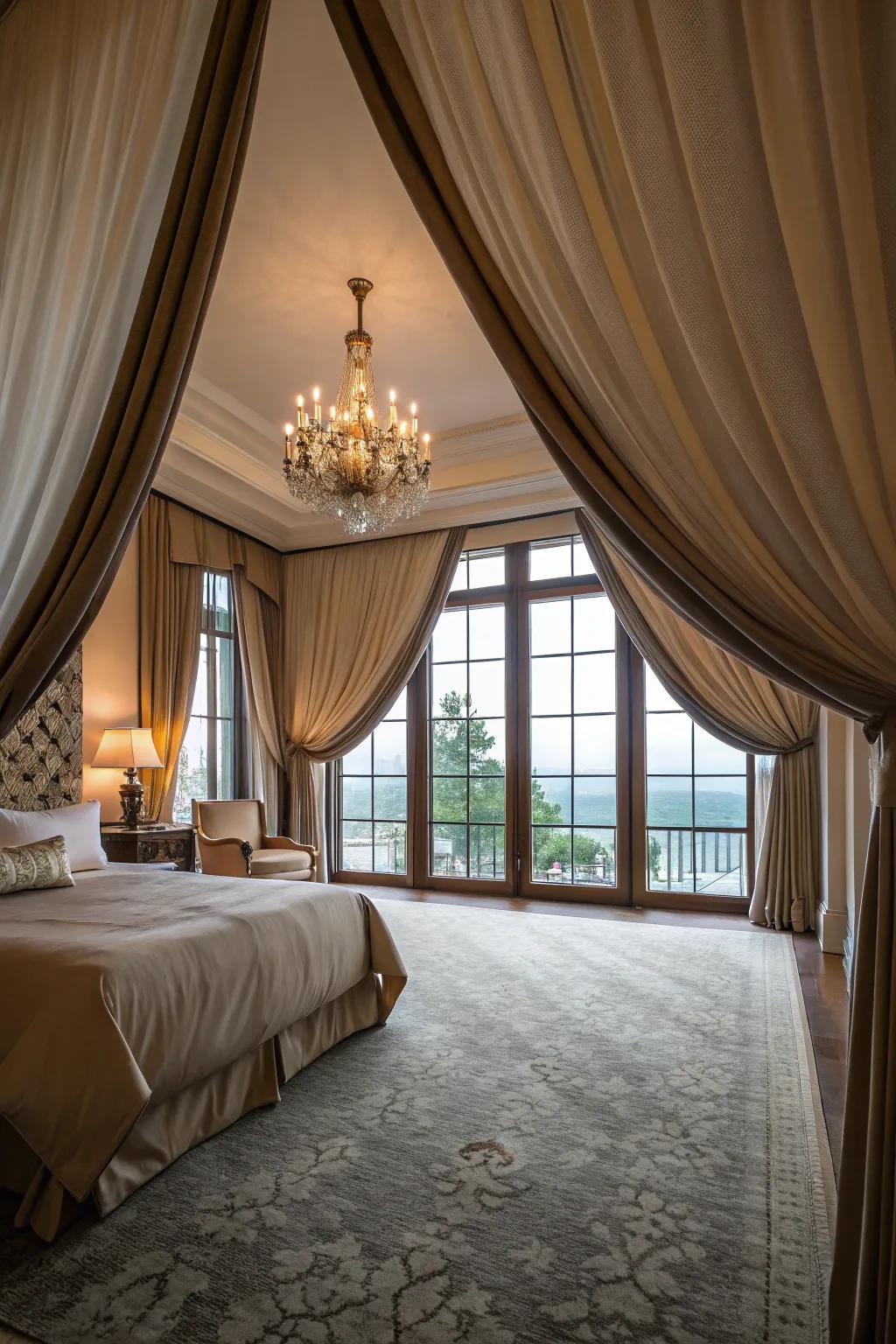 Dramatic window coverings elevate the sophistication and scale of this expansive bedroom.