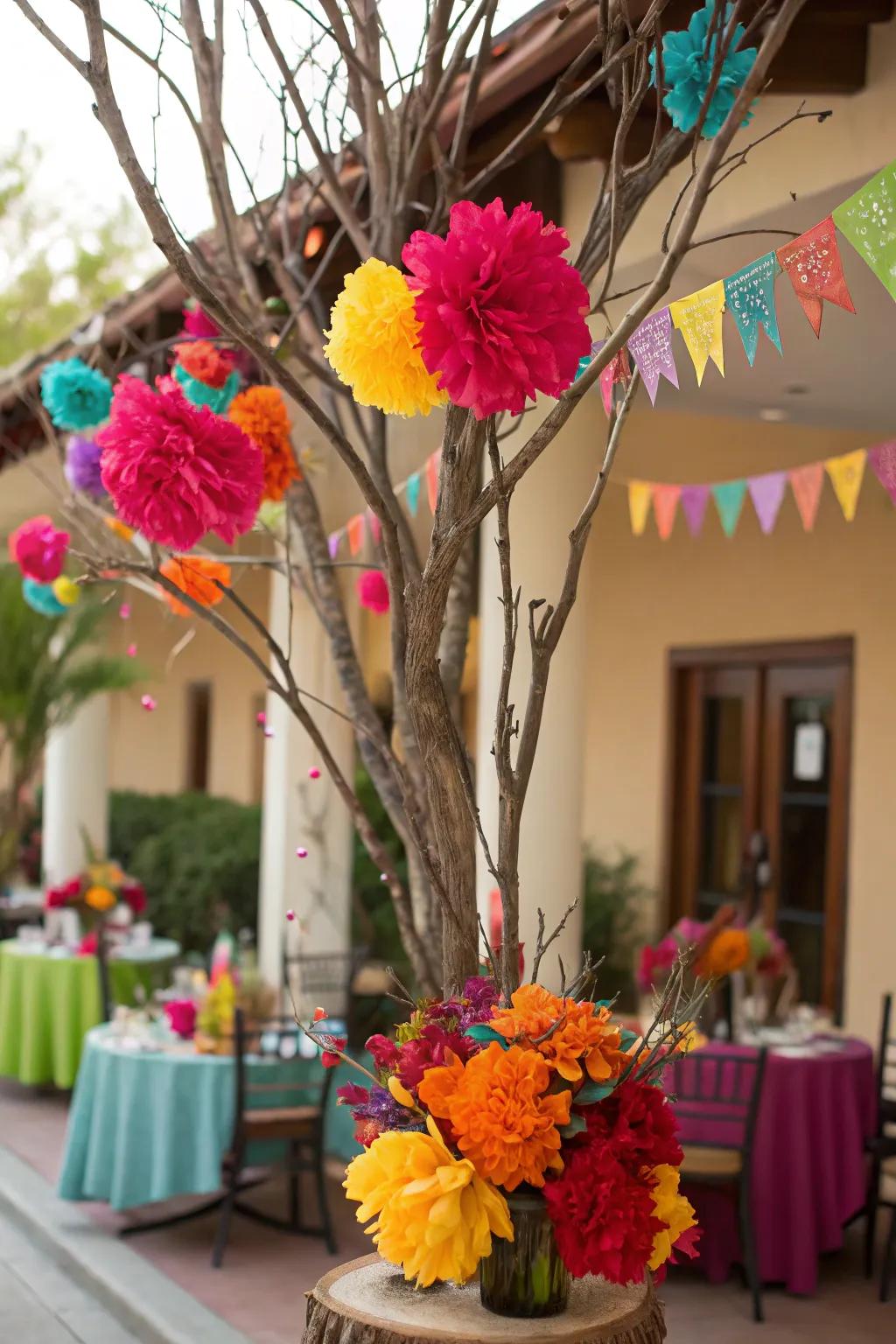 Festive fiesta using bright shades and paper blossoms upon manzanita stems.