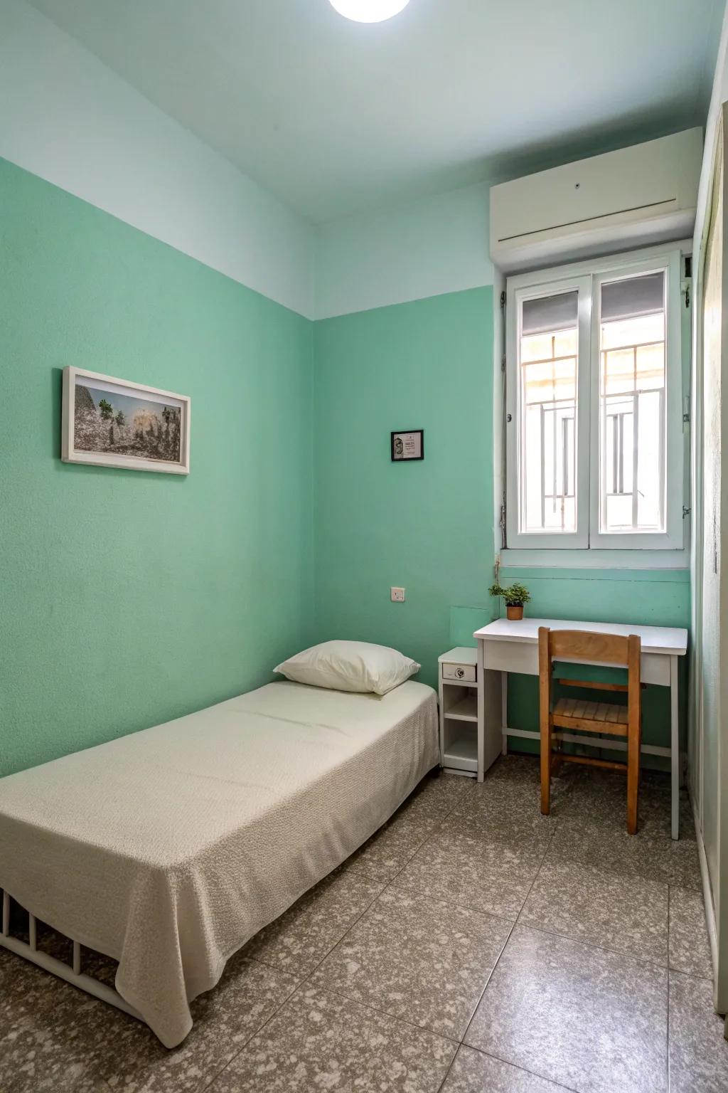 A minimalist sanctuary featuring subtle seafoam green painted walls.