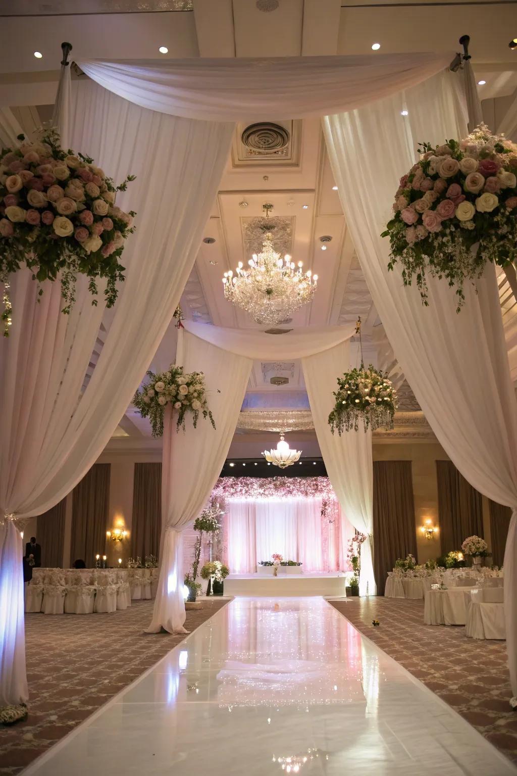 Craft an unforgettable experience through drapery and suspended florals.