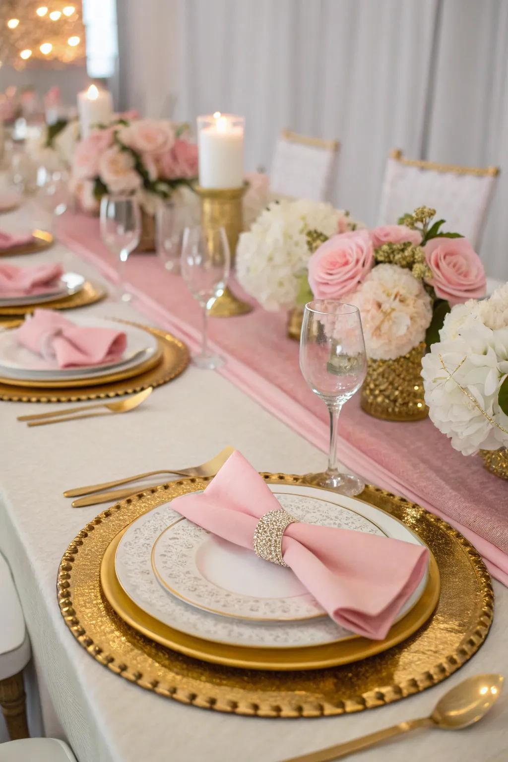 An elegant table display accented with rose, gold, and alabaster.