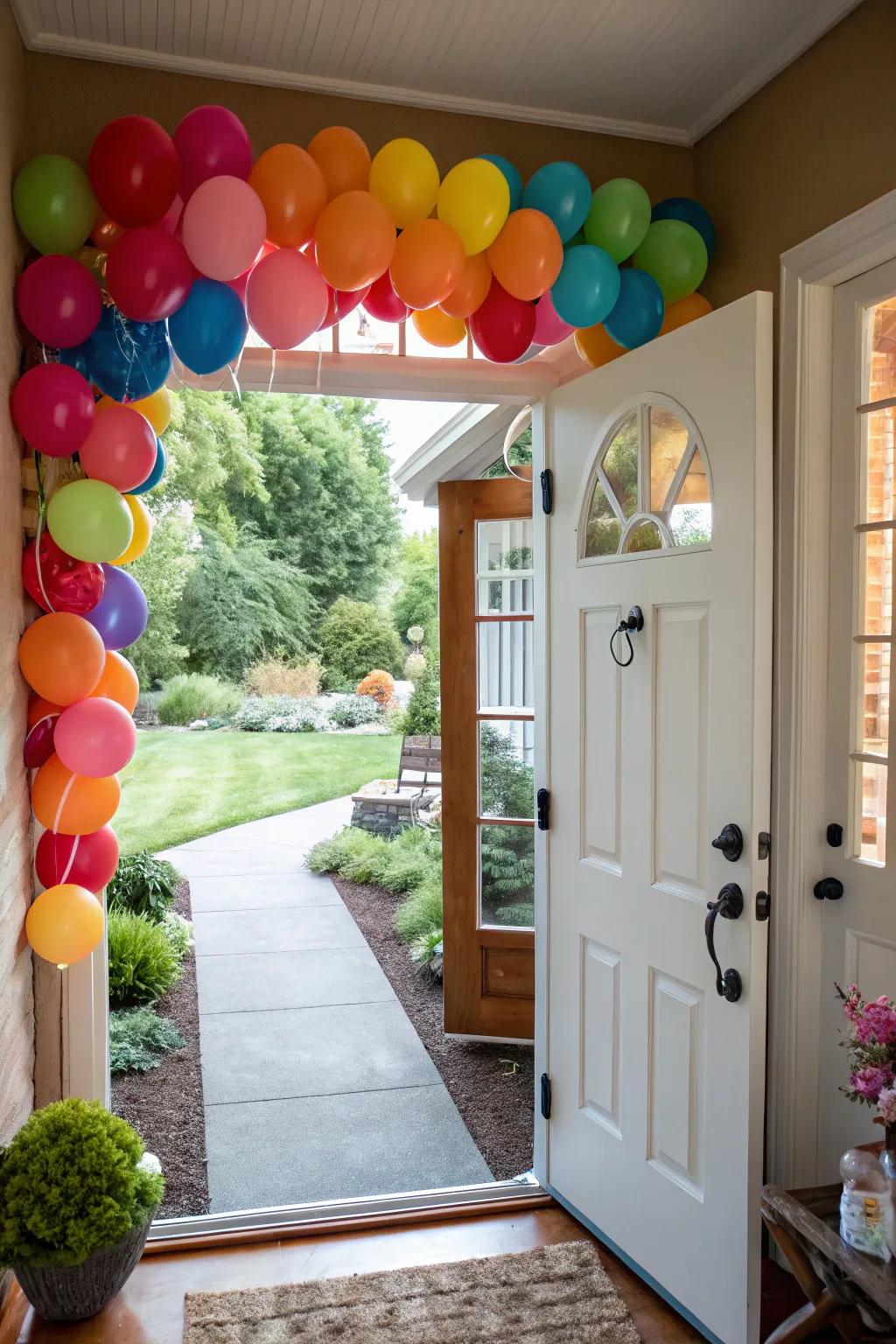 A vivid balloon garland ornamenting the entrance of a residence