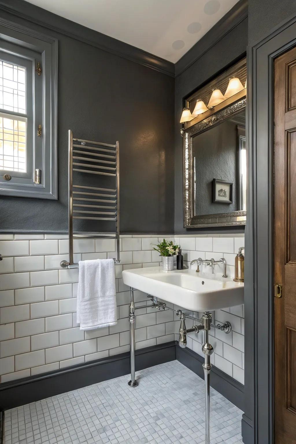 Deep charcoal grey walls infuse depth and drama into this elegant bathroom.